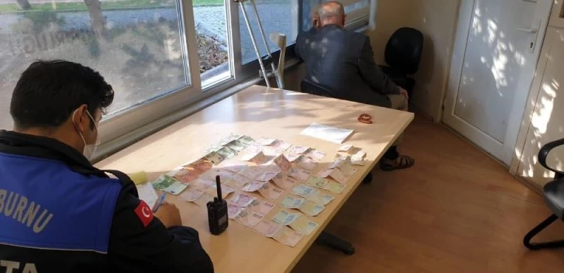 (ÖZEL) Dilencinin üstünden çıkan paralar şoke etti
