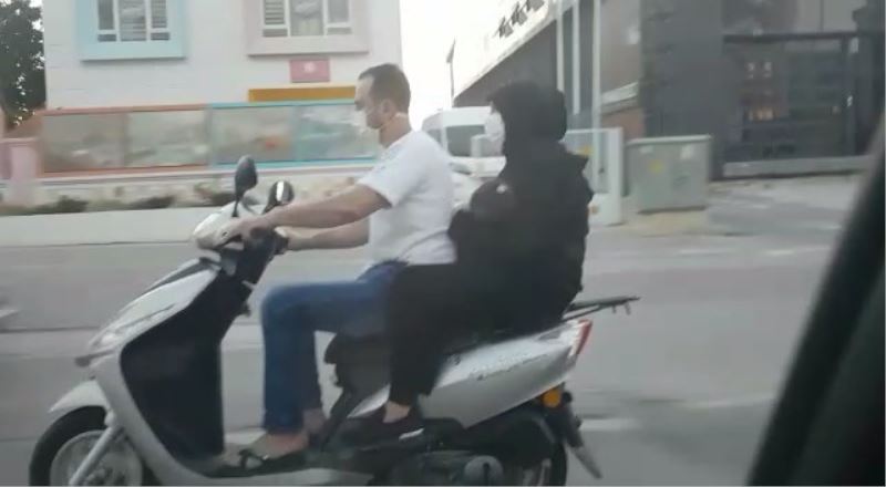 (Özel) Motosiklet üzerinde bebekli çiftin tehlikeli yolculuğu
