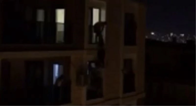 Sinir krizi geçirerek 5. kattan atlamaya kalkan kadını alt kattaki genç kurtardı
