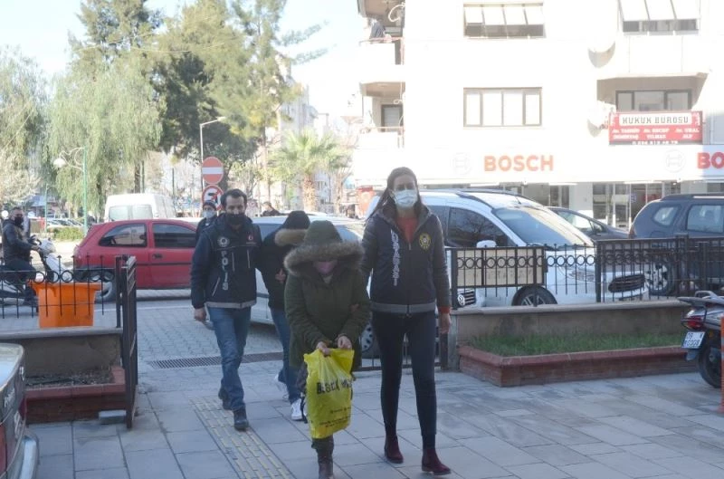 Şüpheli kadının beline sarılı halde 1 kilo uyuşturucu bulundu
