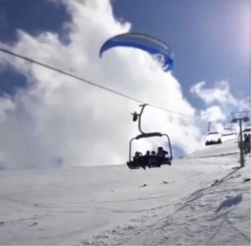 Paraşütçünün telesiyeje takıldığı anlar kamerada
