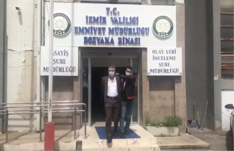 Mutfak dolabından cinayet zanlısı çıktı
