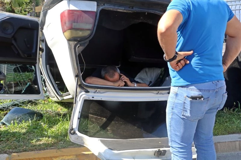 (Özel) Sıkıştığı ters dönen aracın içinde cep telefonunu elinden bırakmadı
