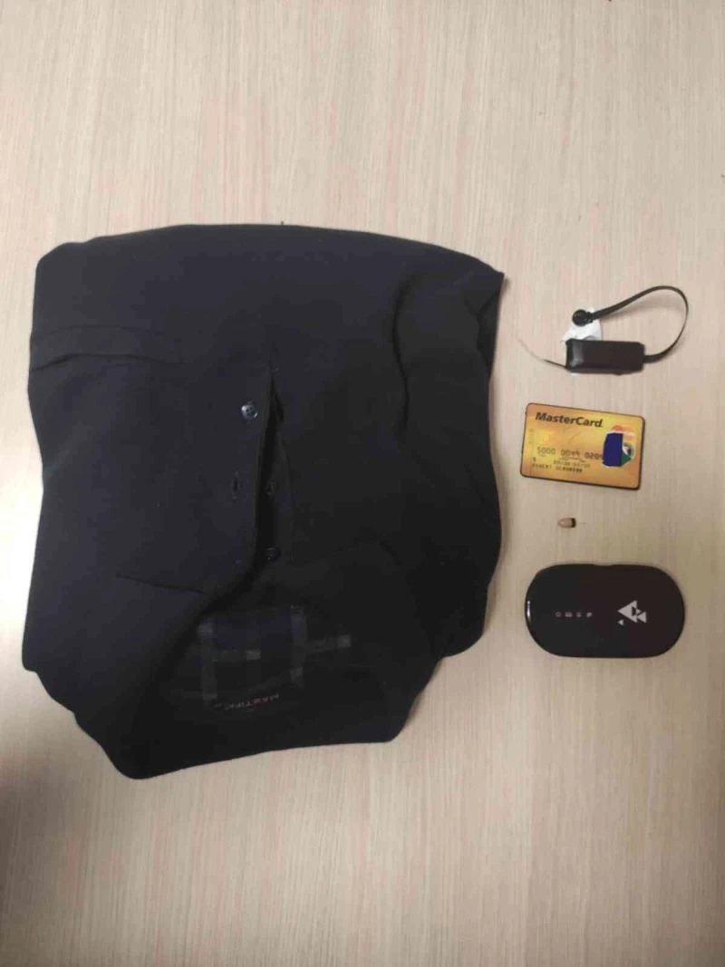 Ehliyet sınavına kameralı kopya düzeneği ile girmeye çalışırken yakalandı
