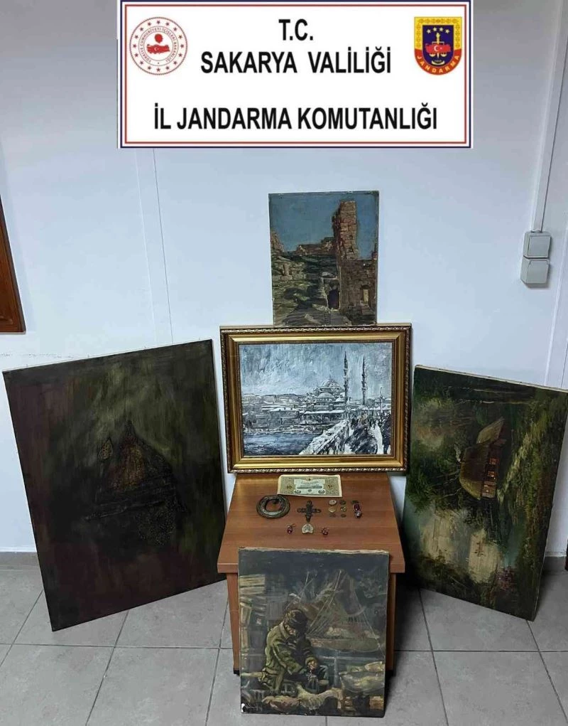 Tablo ve tarihi eserlerle yakalandı, serbest kaldı
